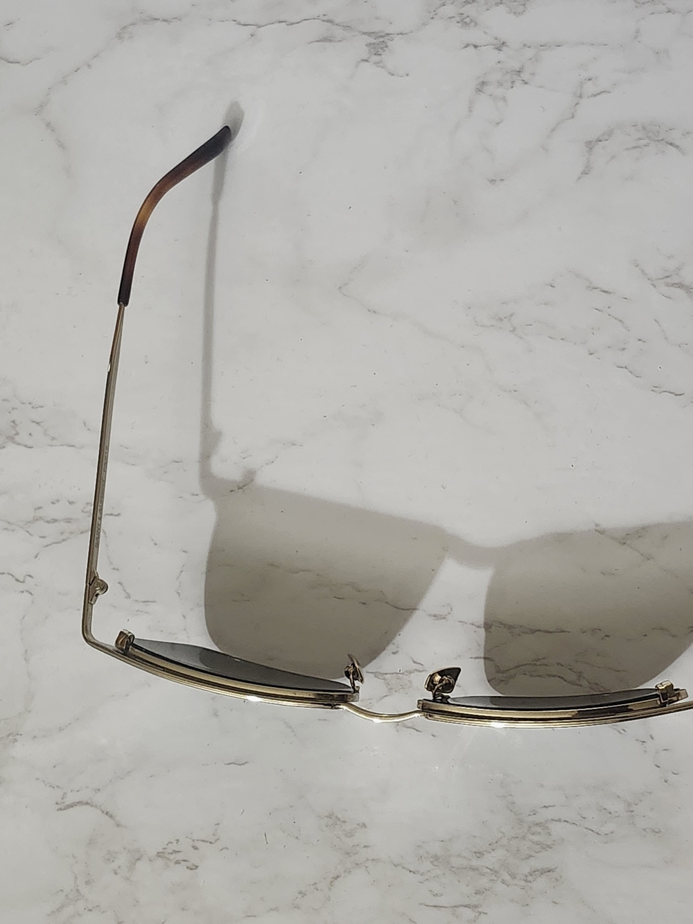 Saint Laurent Gold Metal Rim Sunglasses with Smoke Lenses